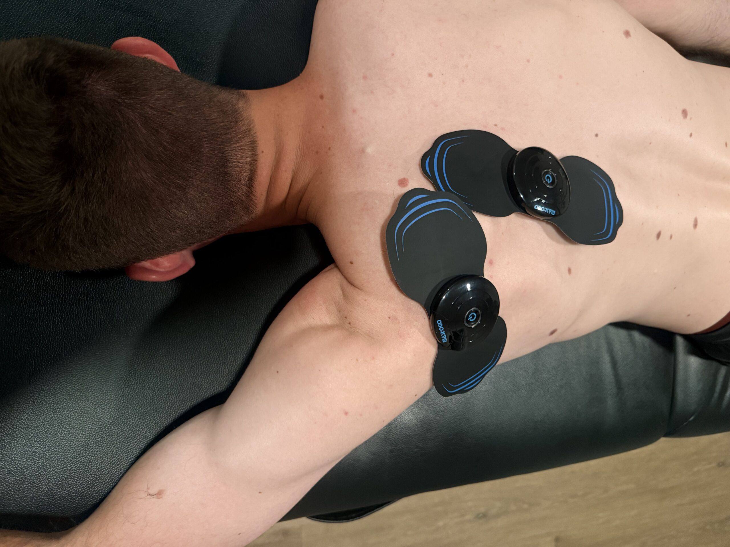 Client performing corrective exercises under guidance of physical therapist at home